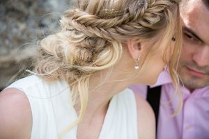 Blonde woman with messy braided crown hairstyle